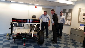 NSK Steering Systems America Inc. Bennington Plant Manager Michael Allen shows Governor Phil Scott training equipment on March 6, 2017.